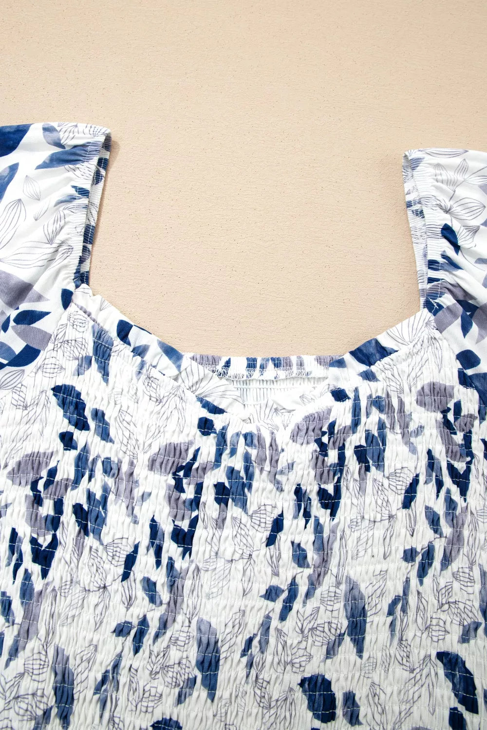 Smocked Bodice Short Puff Sleeve Tiered Floral Midi Dress - Be Bliss Boutique