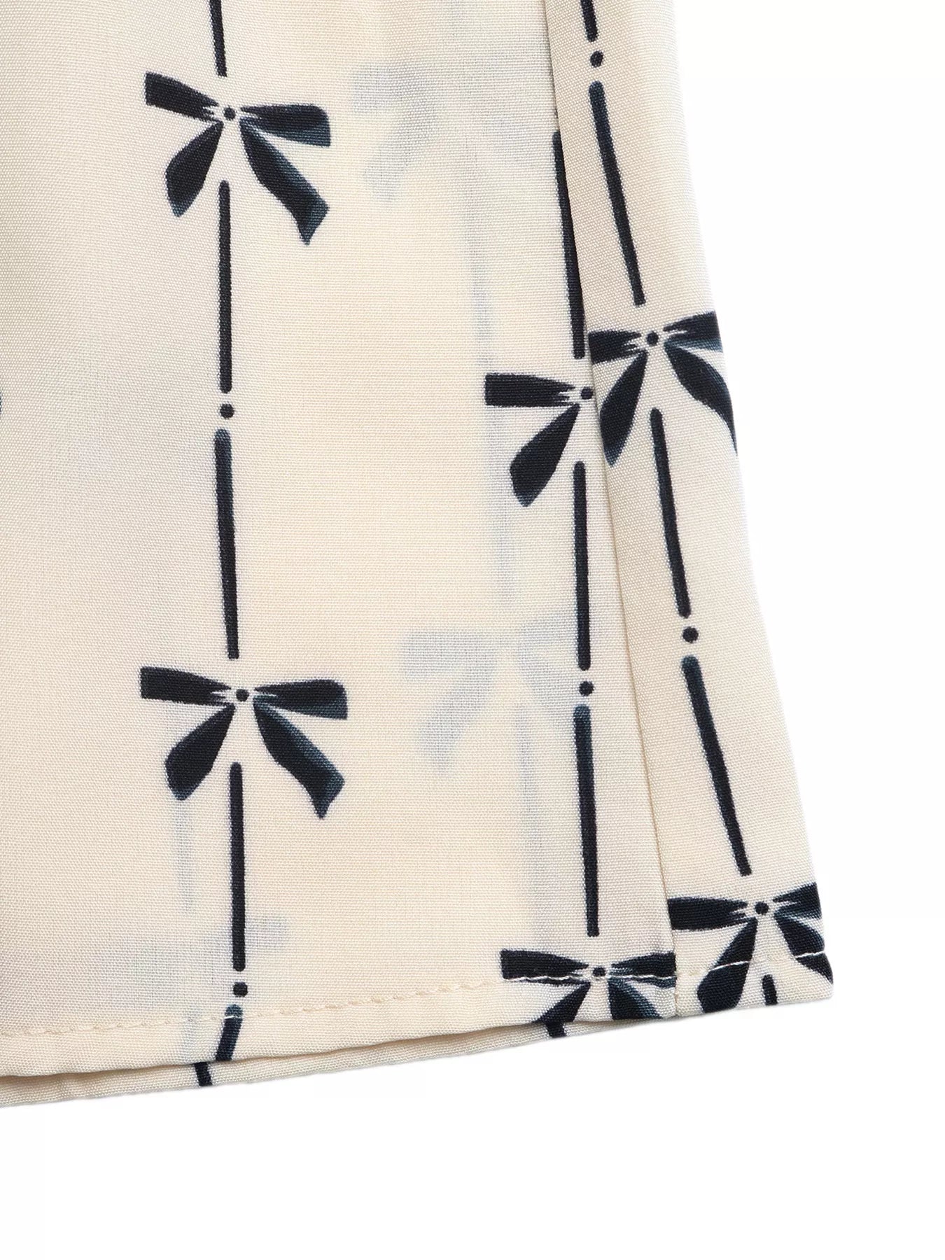 Bow Print Smocked Halter Neck Romper - Be Bliss Boutique