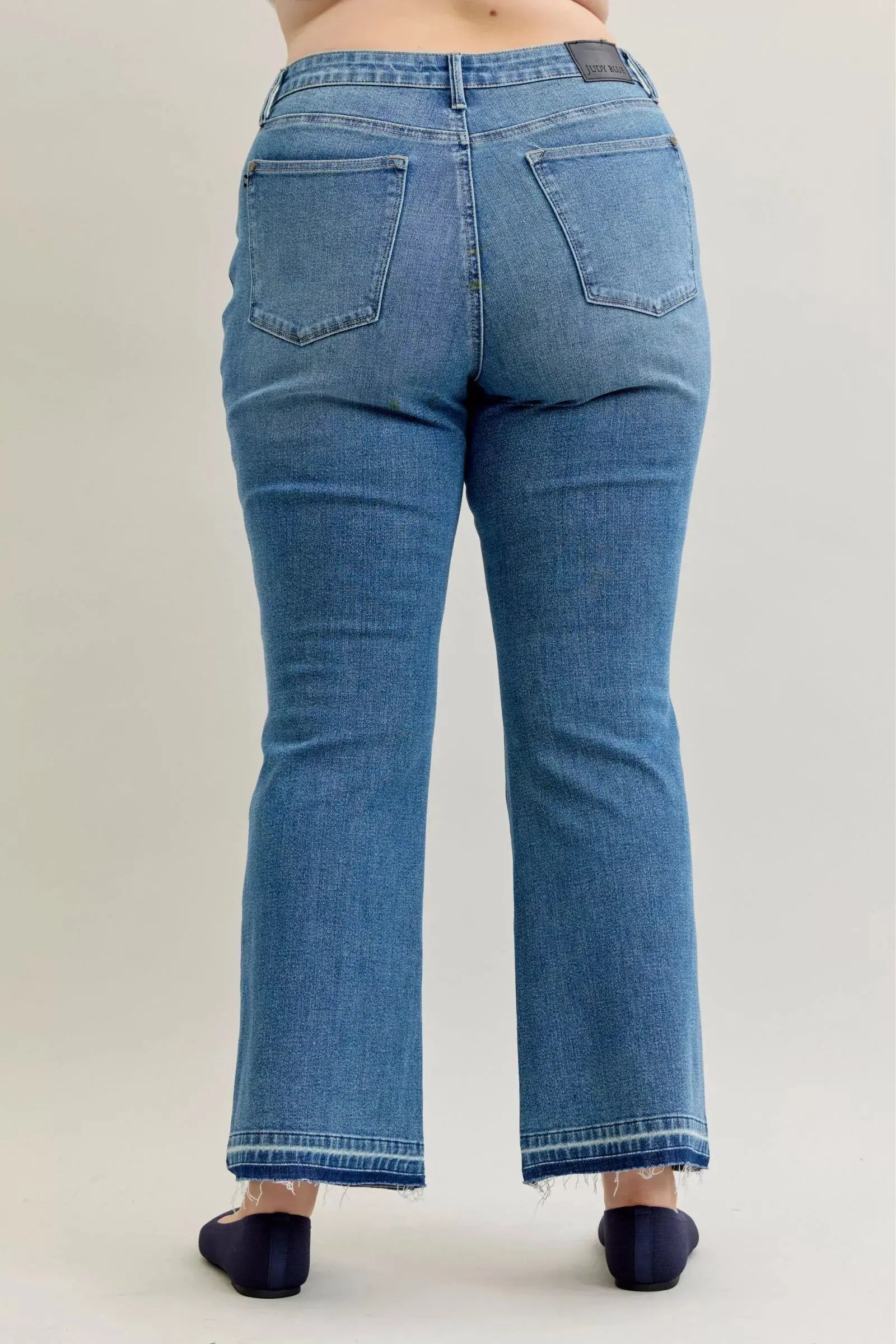 Judy Blue Jeans - Full Size Mid Rise Slim Bootcut Tummy Control Release Hem Jeans - Be Bliss Boutique