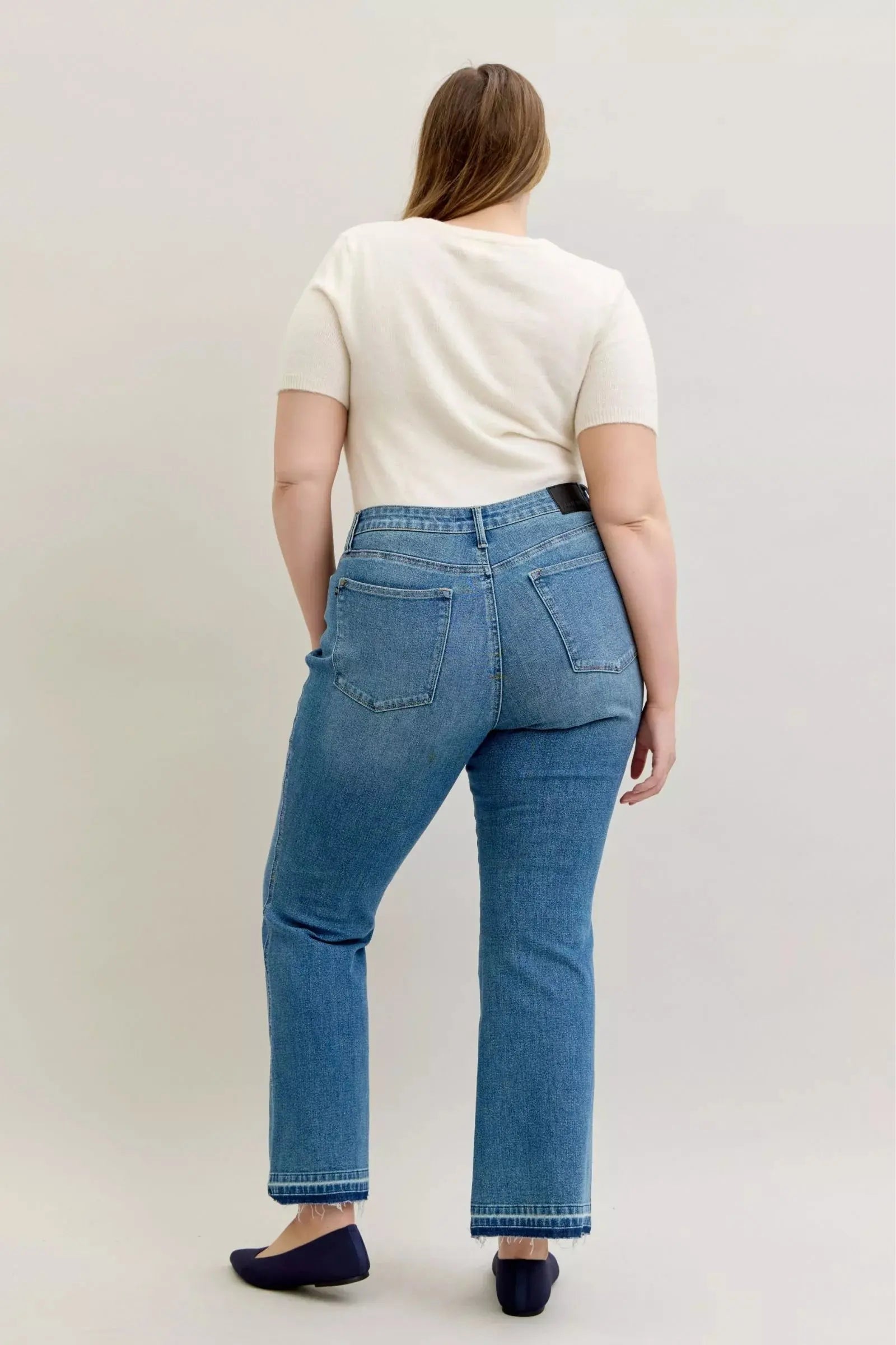 Judy Blue Jeans - Full Size Mid Rise Slim Bootcut Tummy Control Release Hem Jeans - Be Bliss Boutique