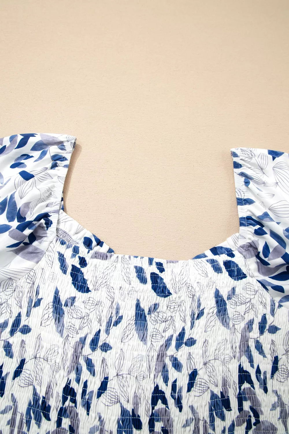 Smocked Bodice Short Puff Sleeve Tiered Floral Midi Dress - Be Bliss Boutique