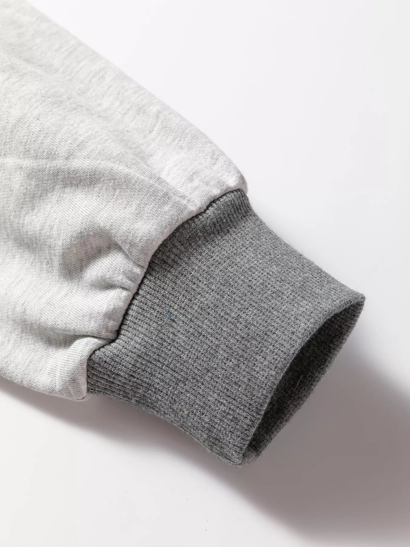 Exposed Seam Patchwork Uneven Hem LOVE Graphic Sweatshirt - Be Bliss Boutique