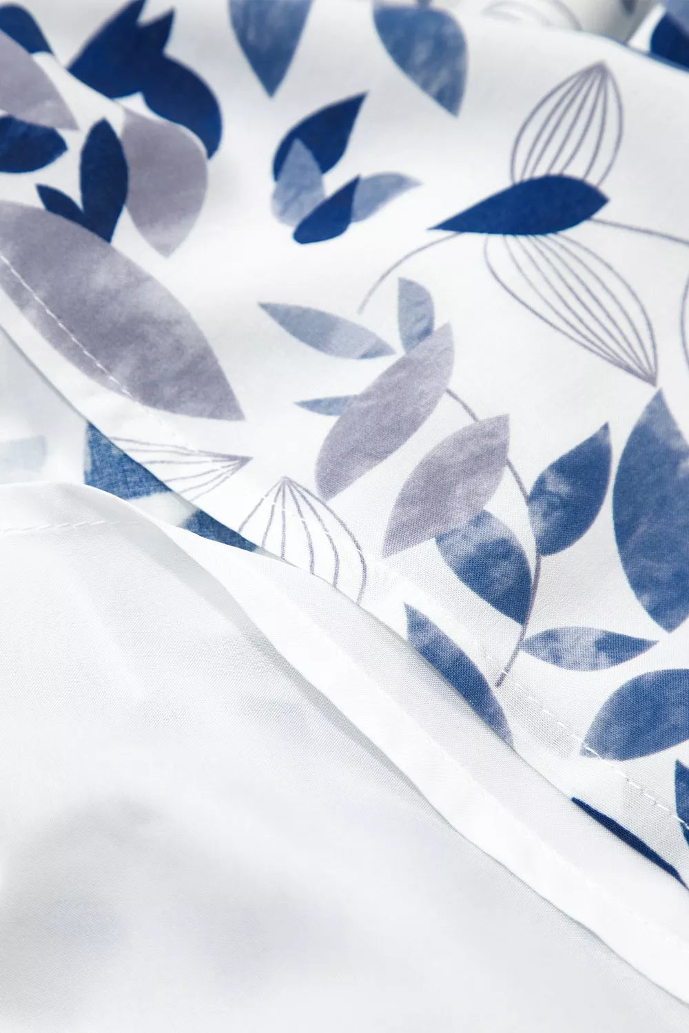 Smocked Bodice Short Puff Sleeve Tiered Floral Midi Dress - Be Bliss Boutique