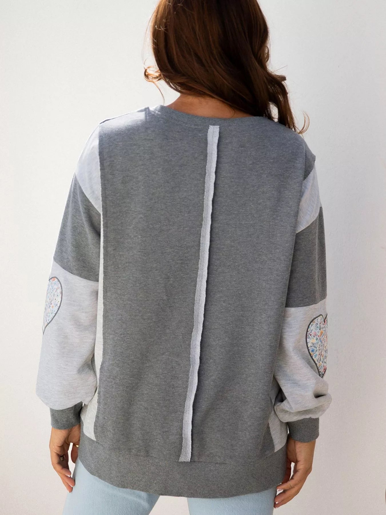 Exposed Seam Patchwork Uneven Hem LOVE Graphic Sweatshirt - Be Bliss Boutique