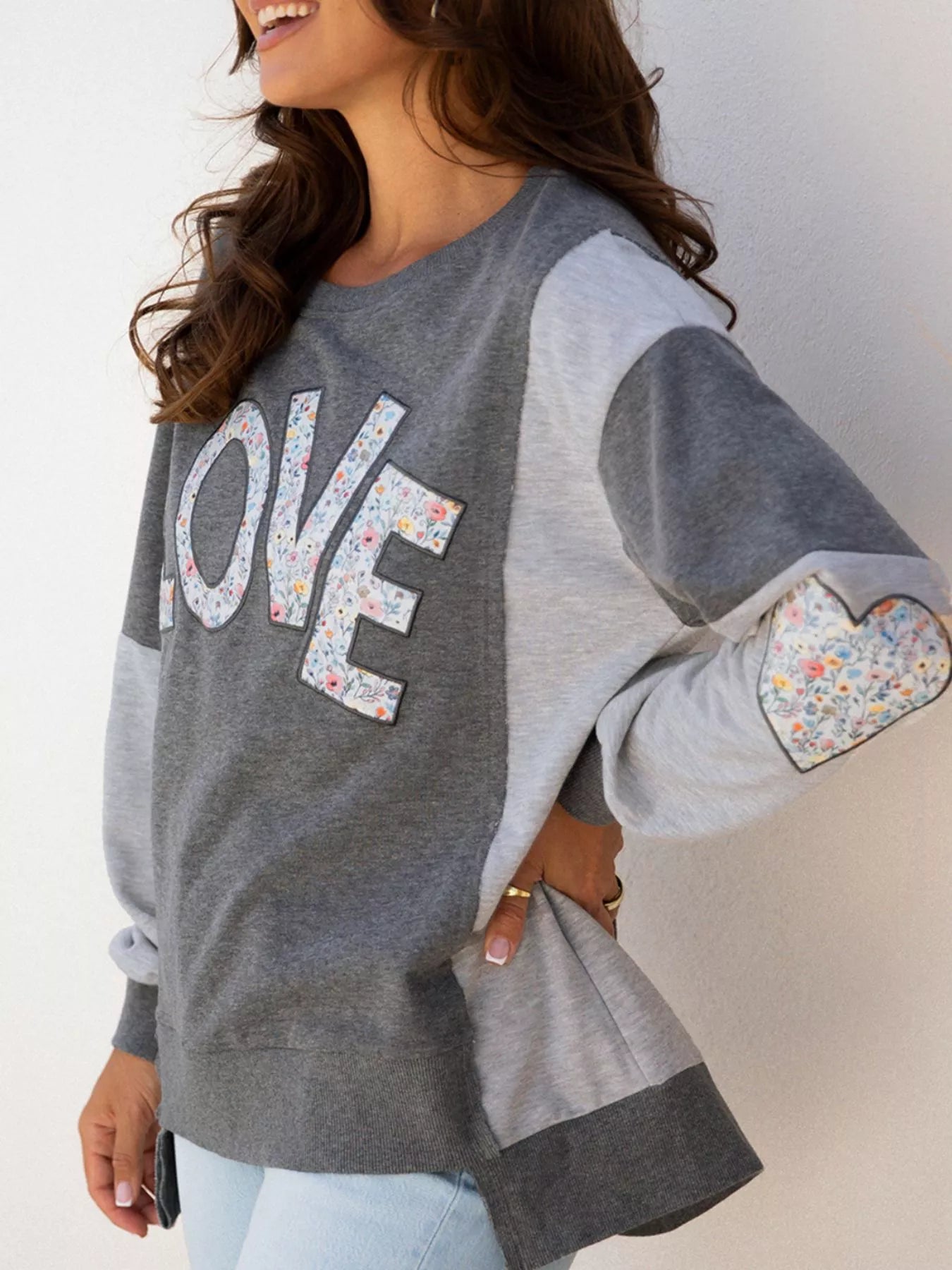Exposed Seam Patchwork Uneven Hem LOVE Graphic Sweatshirt - Be Bliss Boutique