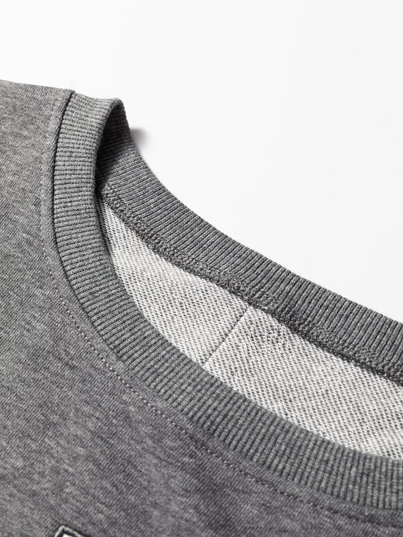 Exposed Seam Patchwork Uneven Hem LOVE Graphic Sweatshirt - Be Bliss Boutique