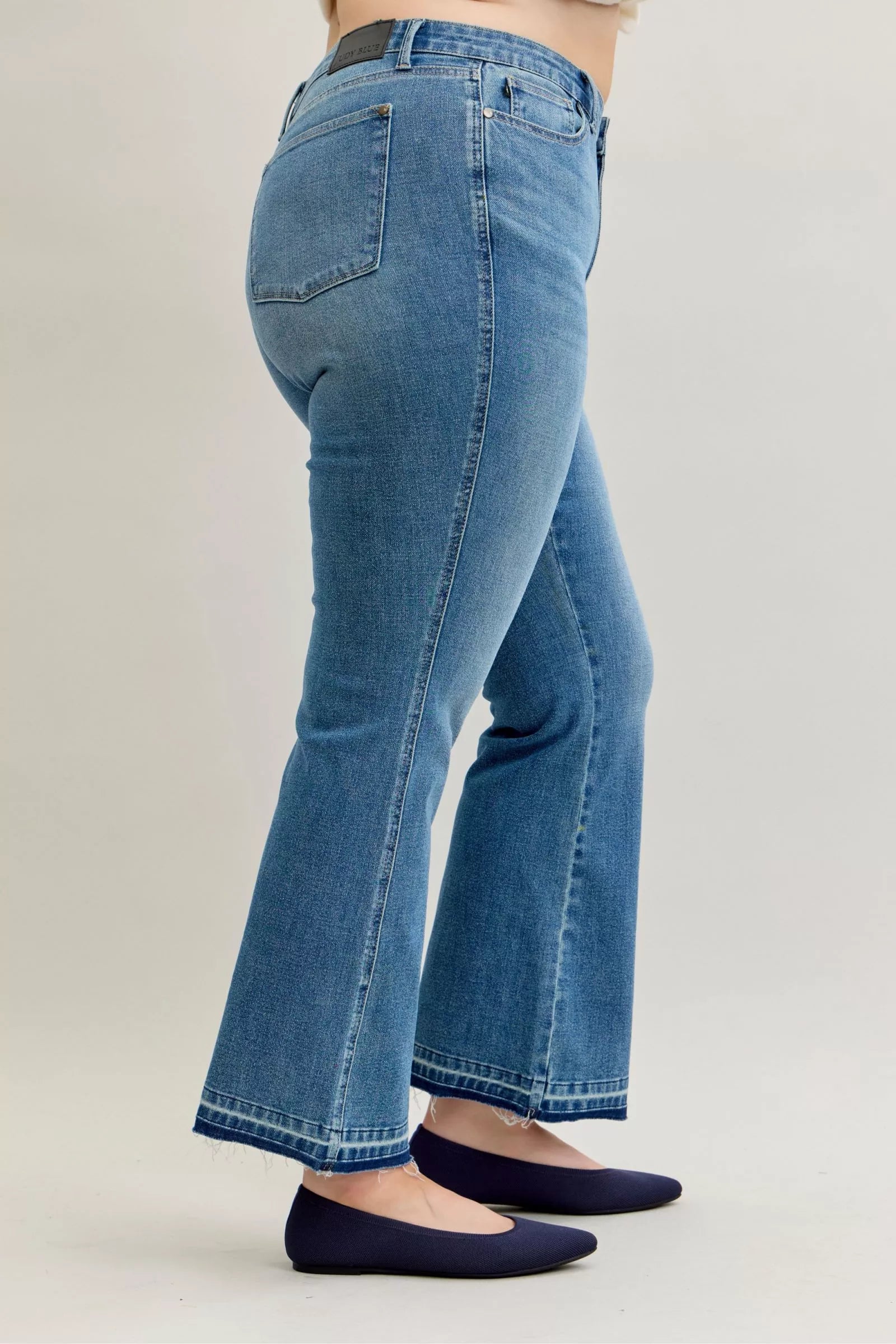 Judy Blue Jeans - Full Size Mid Rise Slim Bootcut Tummy Control Release Hem Jeans - Be Bliss Boutique