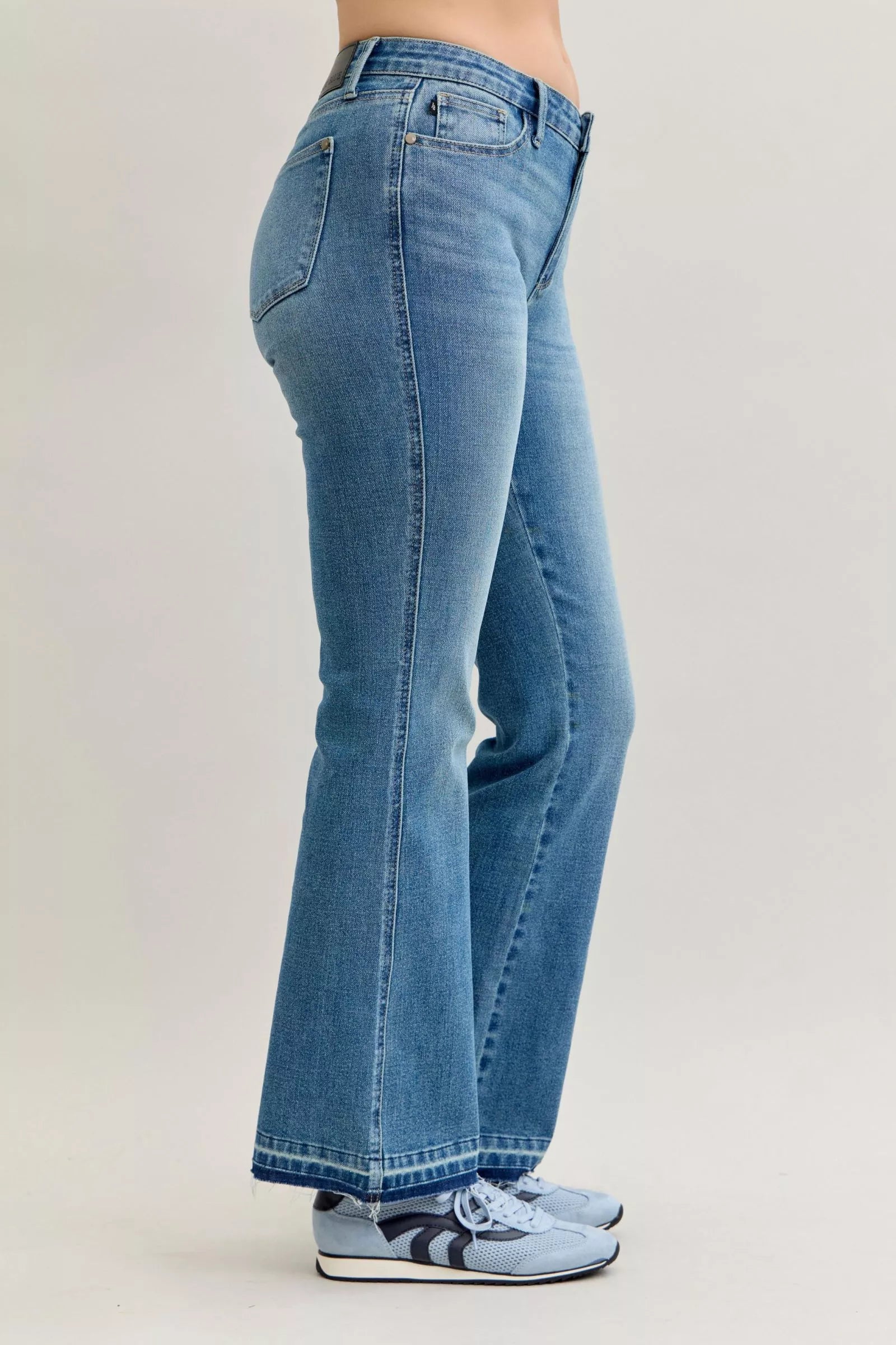 Judy Blue Jeans - Full Size Mid Rise Slim Bootcut Tummy Control Release Hem Jeans - Be Bliss Boutique