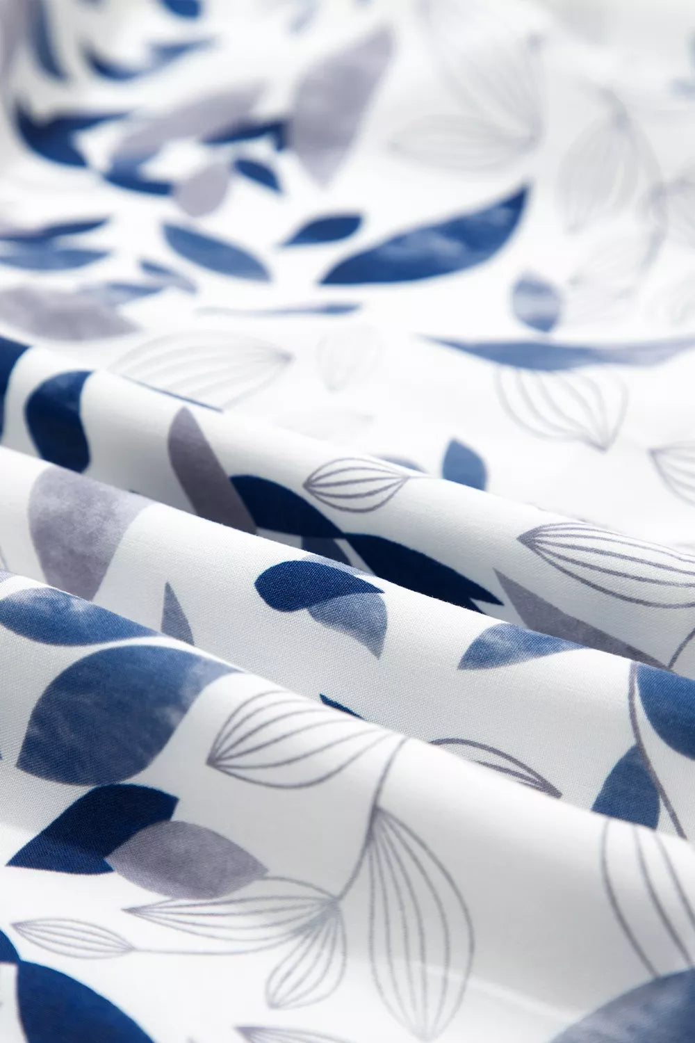 Smocked Bodice Short Puff Sleeve Tiered Floral Midi Dress - Be Bliss Boutique