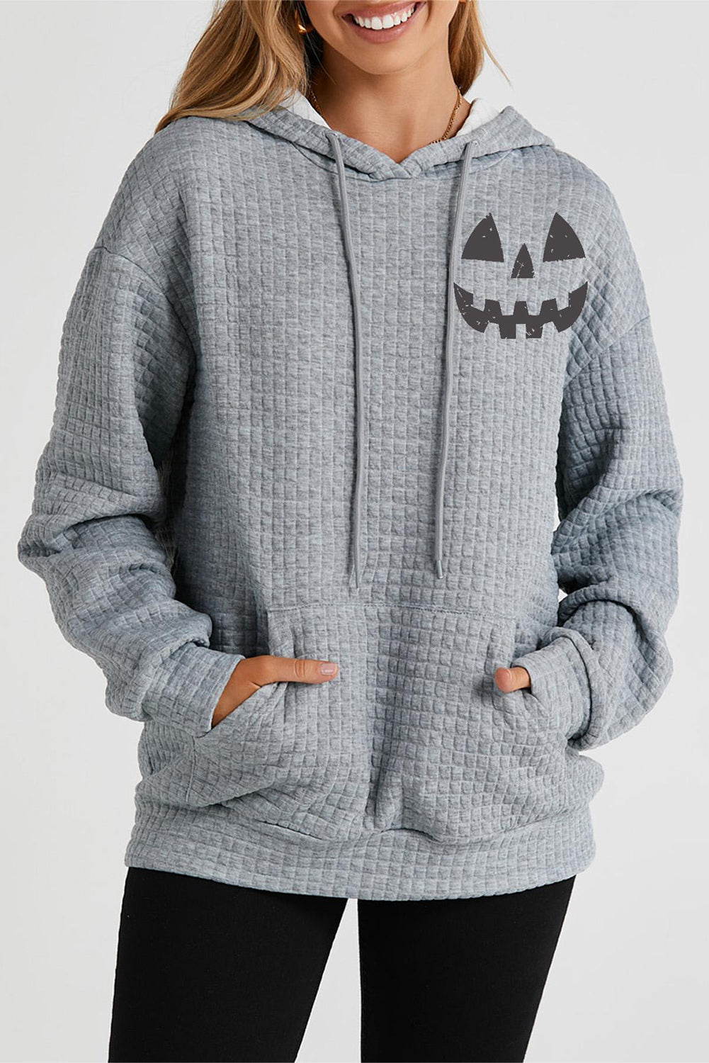Pumpkin Face Graphic Drawstring Hoodie with Pocket -  Be Bliss Boutique