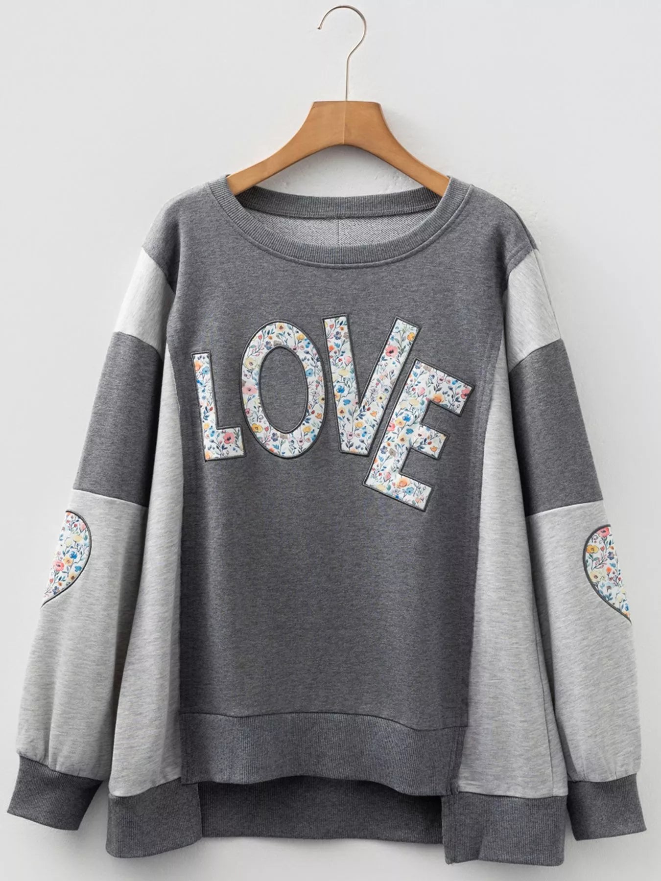 Exposed Seam Patchwork Uneven Hem LOVE Graphic Sweatshirt - Be Bliss Boutique